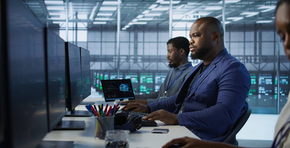portrait-happy-server-room-worker-developing-disaster-recovery-plans