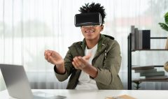 african-american-looking-through-vr-holding-interesting-data-meta-contrivance_31965-566576