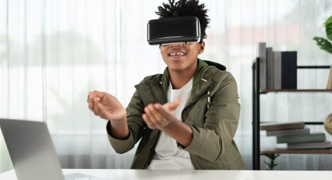 african-american-looking-through-vr-holding-interesting-data-meta-contrivance_31965-566576
